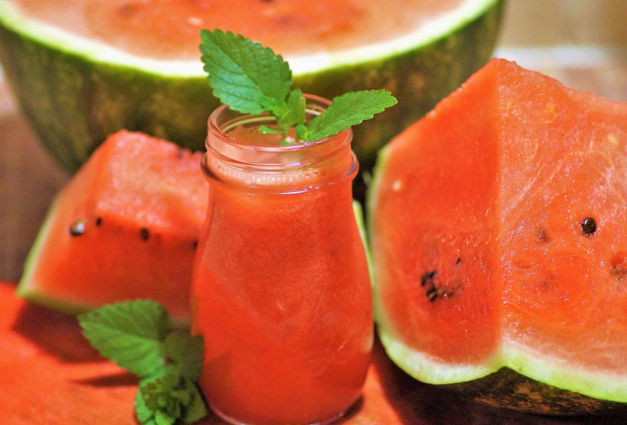 Rows of e-liquid bottles in assorted fruit and mint flavors on shelves